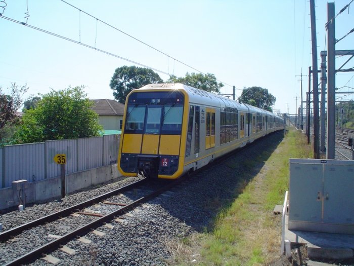 Tangara's T12/5 arrive at Lidcombe Sprint Platform.