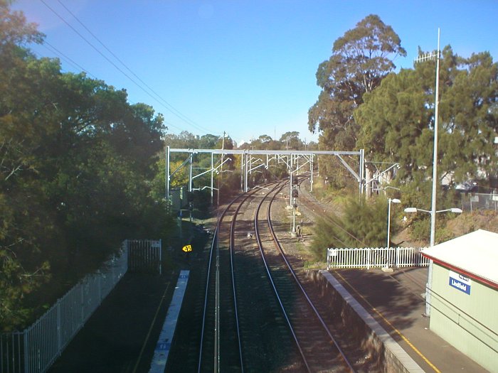 The view looking south. The tracks from left to right are the Up Shore, Local Platform, and Down Shore.