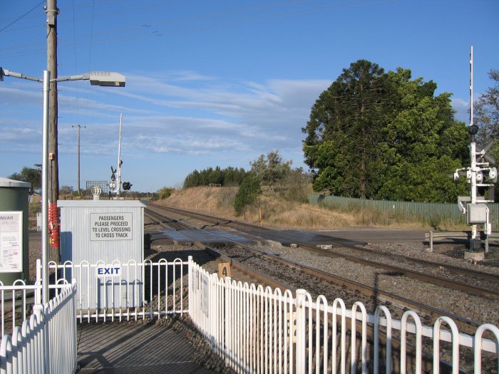 The level crossing at the up end of the station.