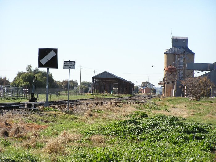 The view looking east into Lockhart Station/yard area from the level crossing on Urana St (Main Road No. 59).