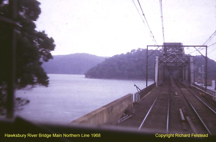 The view looking north from the front of a down train as it approaches the Hawkesbury River Bridge having just exited the Long Island tunnel.