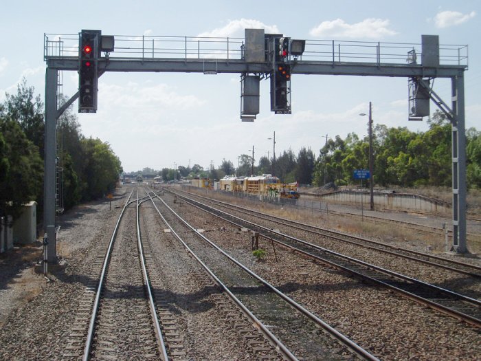 A view of the Maitland Down Home Signal Gantry from the Coal Road, which also shows the Perway sidings to the right.