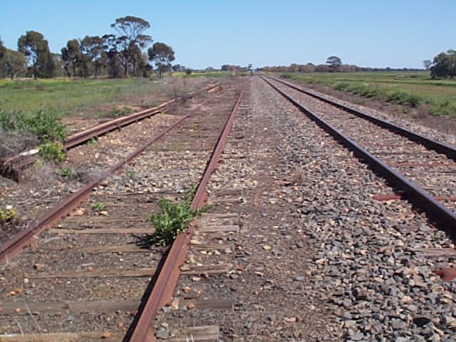 The view looking west. The stattion was located on  the right foreground, with the  goods shed and platform on opposite on the left hand side.