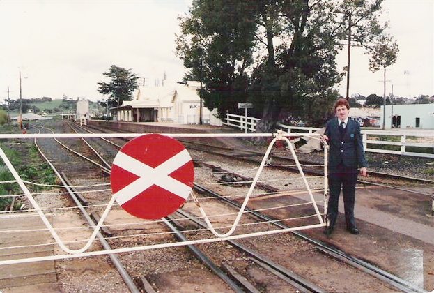 The manually-operated level crossing gates at the down end of the station.