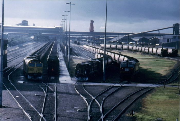 
The BHP sidings at Tighes Hill, showing the various locomotives used to
haul coal trains to the nearby BHP blast furnaces.
