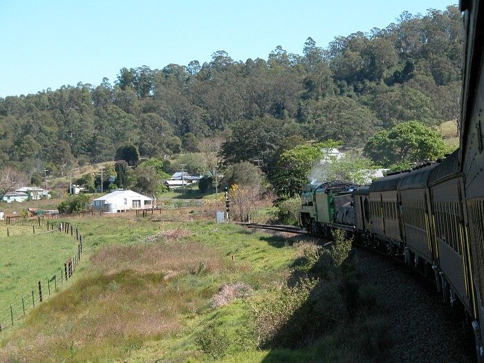 
3801 at the head of a tour train is about to enter the loop at Mount George.

