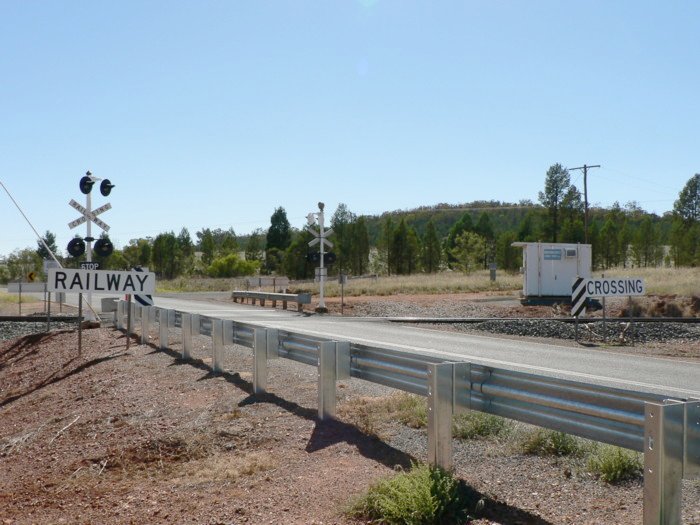 The level crossing at the down end of the location.