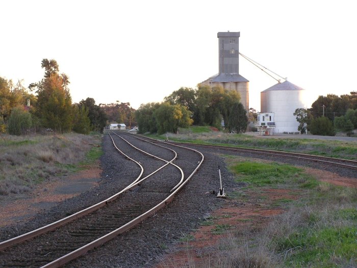 The view looking south through the heavily rationalised yard. The line on the left was the former dual-gauge main line, with the NSW run-around siding adjacent to it. Most of the yard has been removed with all remaining track converted to broad gauge. The siding on the far right is the barley loading siding.
