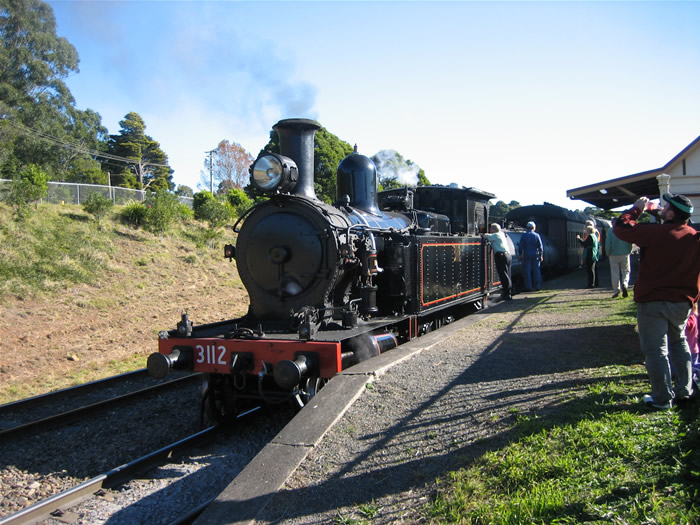Locomotive 3112 stands at Roberston Station. The loop line is visible on the left.