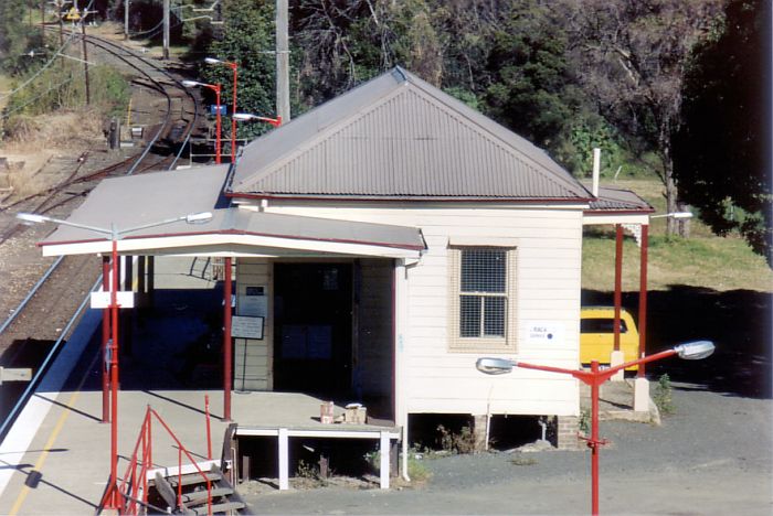 
A closer view of the now demolished and replaced Rydalmere Station looking
towards Camellia. Between the short creek crossing and the
Up Camellia Landmark signal in the distance is the entry into the now
removed Rheem Siding.
