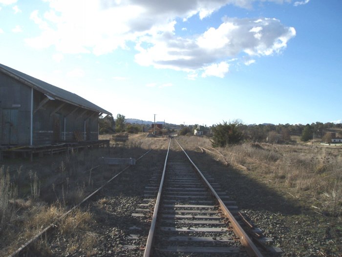 The view ooking down the main line towards Mudgee, the now disconnected loop line/loco siding is on the right, and the two goods sidings are on the left.