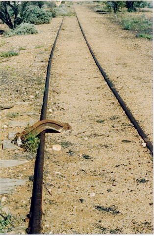 A scotch block on the track at the western end of the location.