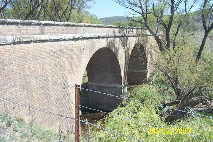 A twin arch brick bridge.