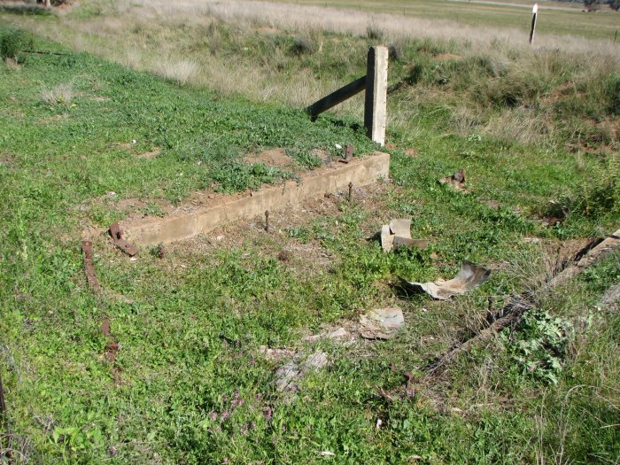A closer view of the remains of a culvert on the quarry siding. The main line can be seen in the background.
