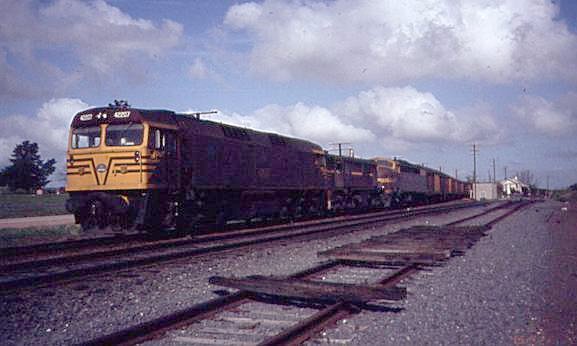 A northbound freight service sits in the loop siding at Table Top.