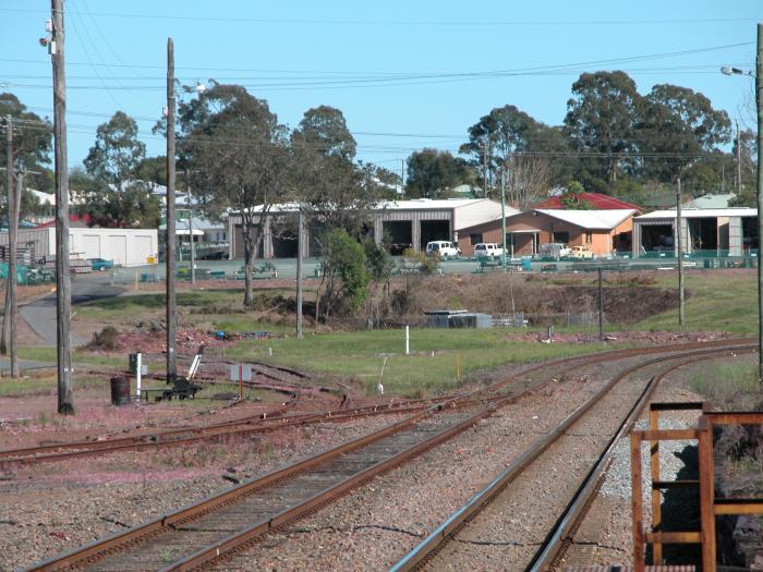 The site of the former Taree Loco depot at the southern end of Taree yard. The cutting made into the embankment at the rear to make room for the roundhouse is still visible.