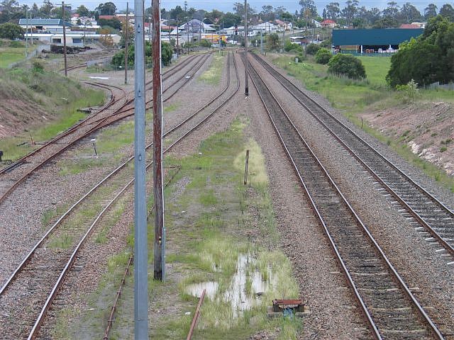 
The view looking north from Telarah Street of the sidings.  Telarah
station is in the far distance.
