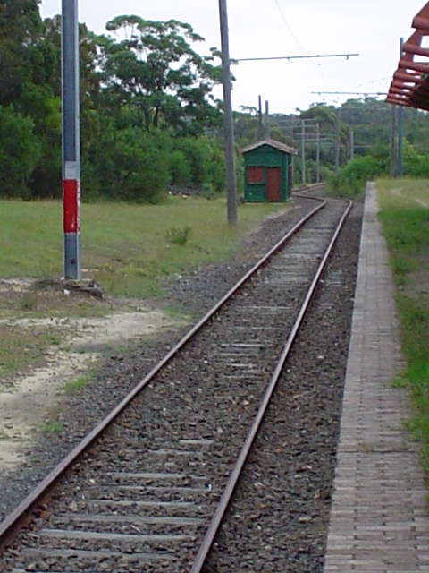 The view looking away from the buffers to the signal box at the end of the station.