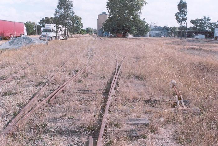 The Culcairn end of the back siding at Walla Walla.  The siding proceeds behind the silos in the distance, past a loading bank and then rejoins the 'silo' siding at the Corowa end of the yard.