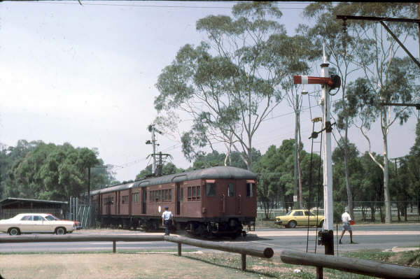 The Warwick Farm Racecourse line crossed the Hume Highway and it was the somewhat dangerous job of flagmen to try and stop the traffic. The signal behind the train pulled "off" was controlled from lever 3 in the Junction Box. 