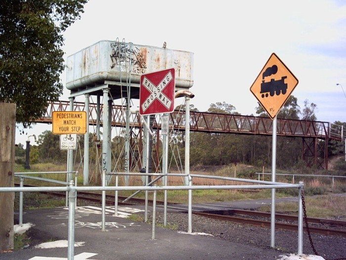 The pedestrian railway crossing adjacent to the station, that replaces the now-closed overhead footbridge.