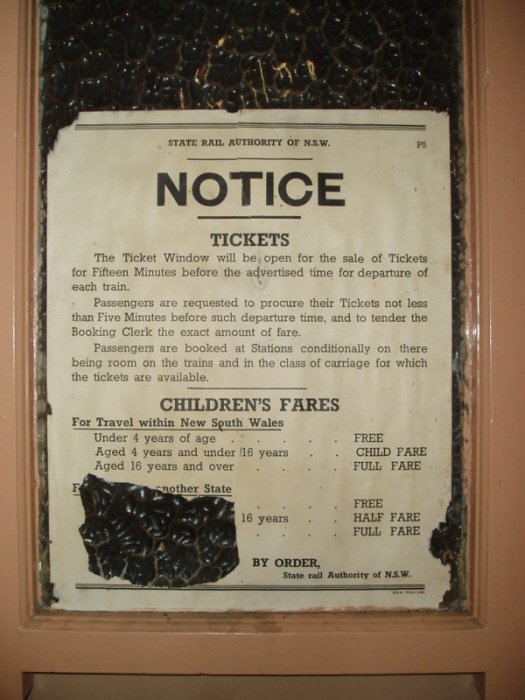 An old ticket price notice above the ticket window at the station. Tickets have not been sold here for quite a few years.