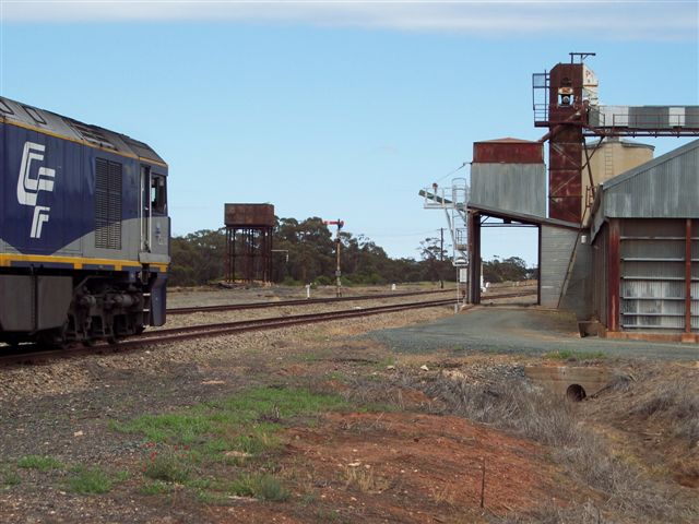 GL111 at the head of a train. The silos on the right and the concrete silo in the background are out of use.
