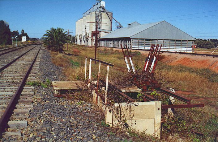 
This lever frame once controlled the yard and junction at Yanco.  It
is no longer in use.  At the far left are a Train Order signal and the
platform.
