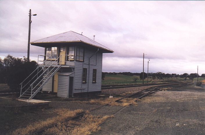 
The elevated signal box at the up end of Yass Junction station.  The line
in the foreground is the one-time branch to Yass Town.
