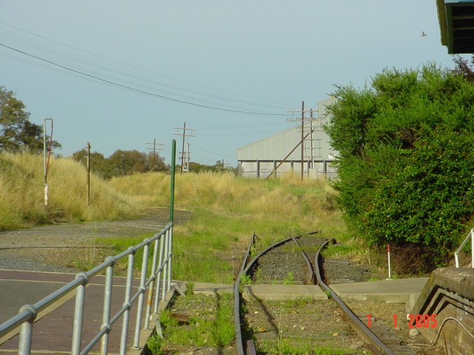 
The view of the actual junction, with the former branch track disappearing
into the grass.
